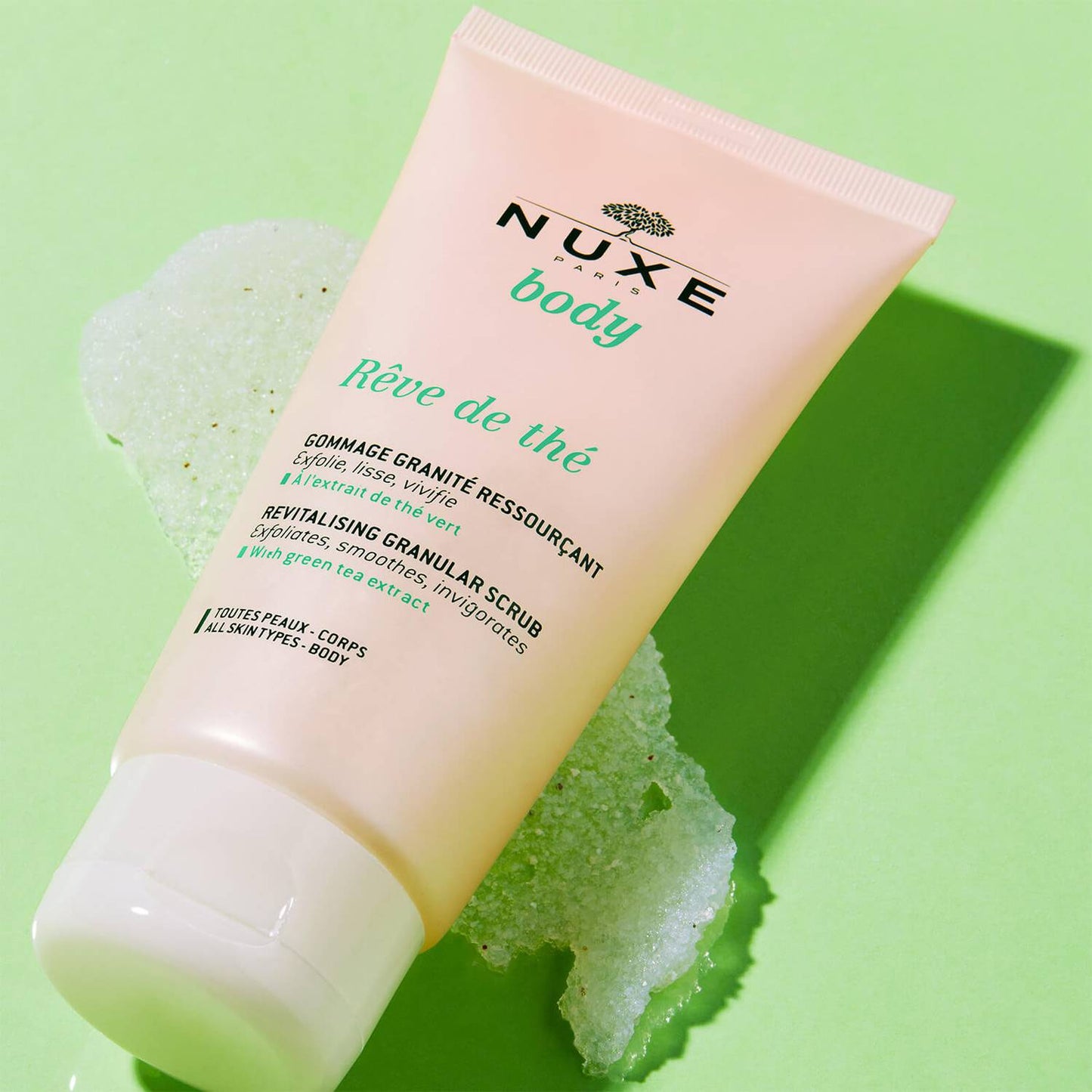 Nuxe Revitalising Granular Scrub, Rêve de Thé with its granular texture and fruity-herbal scent stimulate the senses while imparting a revitalising sensation.